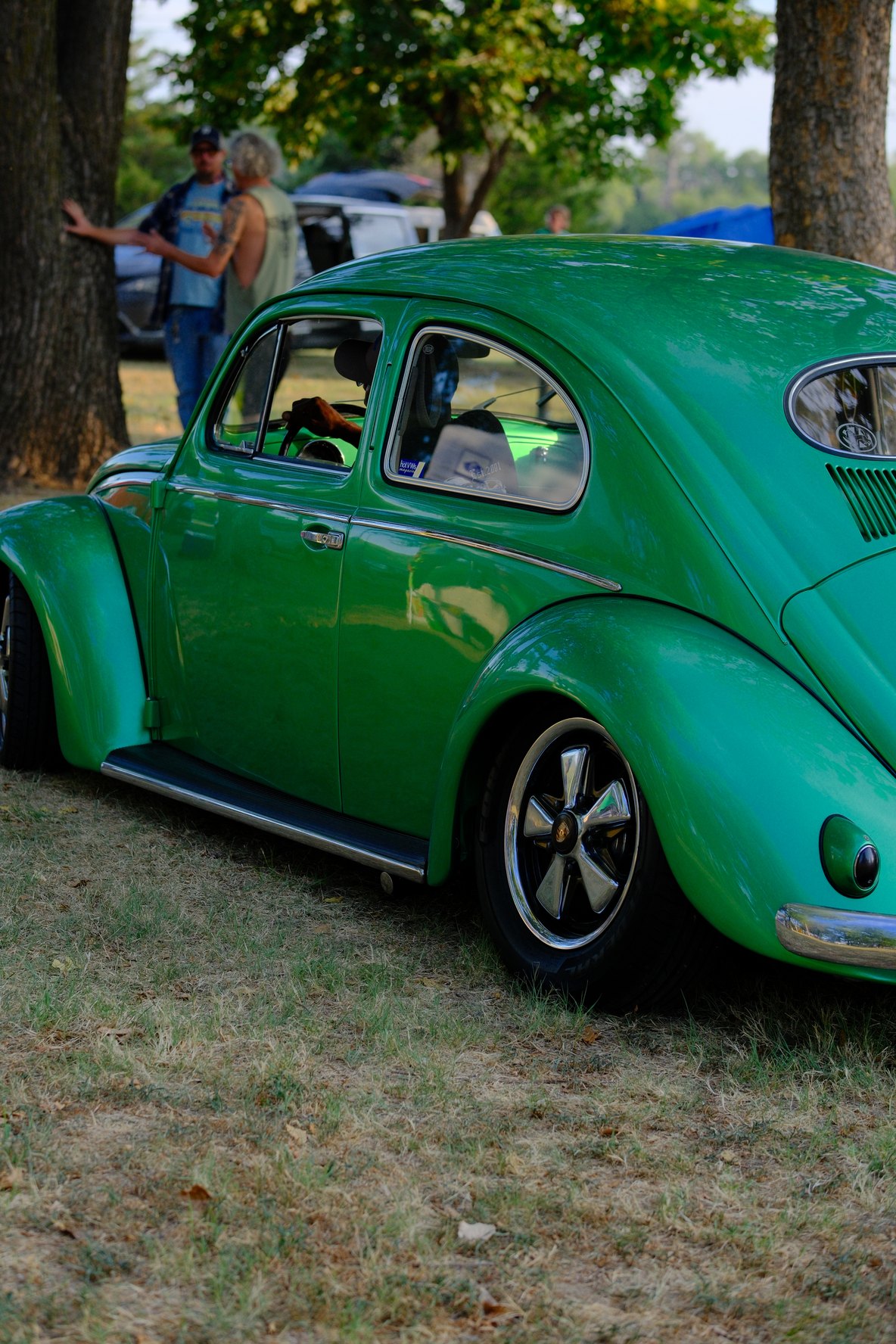 Close detail of the winning green Beetle's front end and chrome bumper